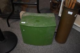 A wooden fishing tackle box with lots of large ledger weights in