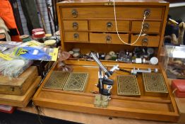 A Vast collection of fly tying equipment presented in a purpose built Fly tying cabinet which is