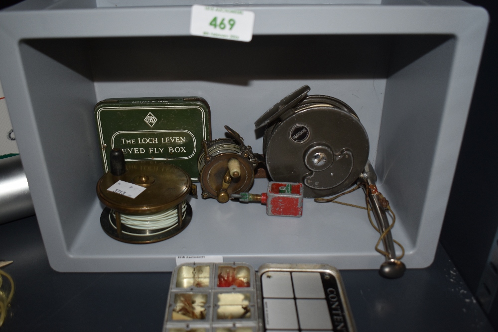 A nice vintage collection of fishing tackle including an Allcocks brass fly reel and split shot tin.