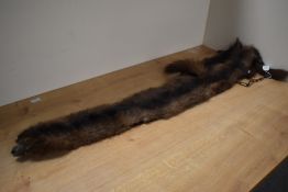 A mink fur stole measuring 90cm long