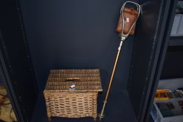 A wicker box style fishing creel measuring 37cm x 24 cm x 28cm along with an english made shooting