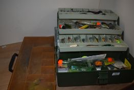 Two tackle boxes containing mixed tackle with many lures and spinners