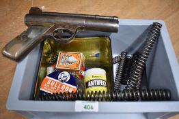 A webley & scott .22 caliber air pistol in poor condition along with a selection of pellets darts,