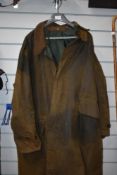 A Barbour stockmans long coat chest size 44 length 112cm