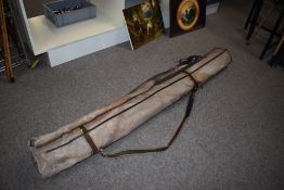 A rod bag containing 4 empty rod tubes