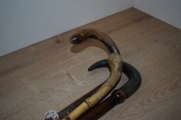 Three short walking canes measuring 84cm long approx