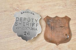 An early 20th-century American metal Special Deputy Sheriff of Kay County, Oklahoma, number 26; sold