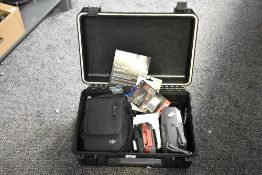 A DJI Mavic Pro drone, with remote controller, original travel case, battery charging hub, small
