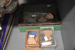 A selection of documented and displayed ancient Egyptian pottery fragments, New Kingdom period,