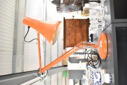 A mid 20th-century orange metal Herbert Terry and Sons Anglepoise model 90 desk lamp, manufactured