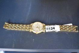 A gent's gold plated Rotary quartz wrist watch having a Roman numeral and baton dial with date