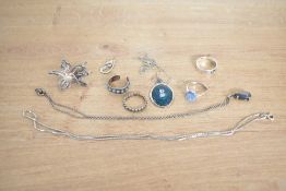 A small assortment of silver and white metal jewellery, comprising four rings, three necklaces and a
