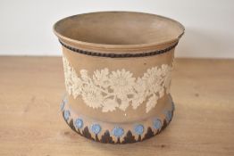 A Victorian Doulton Silicon stone ware vase by Mary Budden (listed in 1882 as a Junior Assistant