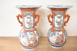 Two 20th-century Chinese porcelain mantel vases, presumed Meiji period, of baluster form with a