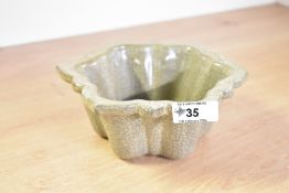 A large Chinese Ge ware brush washer, featuring mallow-shaped petals and five spur marks to base,