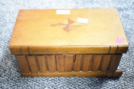 An early 20th-century olive wood puzzle jewellery box, having a secret lock and compartment