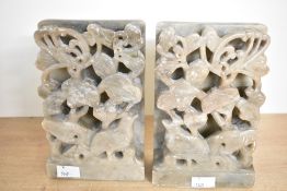 Two thought to be 20th-century Chinese carved soapstone bookends, of square-form, featuring a