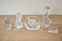 A quantity of four 20th-century studio glass paperweights, including a Caithness Dolphin and a