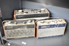 Three 20th-century radios, to include two Roberts R600 portable transistor radios and one larger