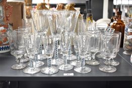 A selection of 20th-century Scottish Mike Hunter Colour Twist glassware, to include six tall wine