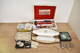 A white marble effect jewellery box, containing an assortment of costume jewellery