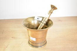 A 19th-century brass Apothecary pestle and mortar, unmarked, 11cm, condition is consistent with