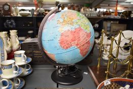 A modern John Lewis plastic illuminated globe lamp upon a stand, marked to base, 40cm, condition