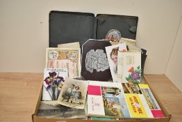 A quantity of late 19th to early 20th-century postcards, note cards, and picture postcards, with
