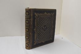 Manuscript Album. A mid-Nineteenth Century leather-gilt commonplace album of mounted prints and