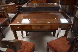 A good Victorian mahogany writing table, the rectangular top with moulded edge detail and shallow