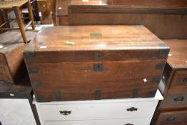 A 19th century brass bound camphor wood chest, of hinged rectangular form with brass capped