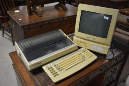 A vintage Amstrad PCW6512 word processor (sold as collectors item and untested)