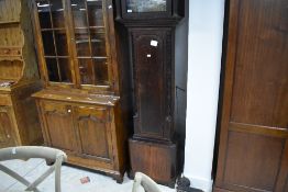 An early 19th century oak long case clock, by Job Grice, Lancaster, having a flat topped hood with