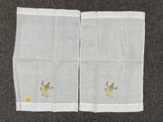 Assorted Portugese white cottons, hand embroidered with charming motifs to include apples, pears,