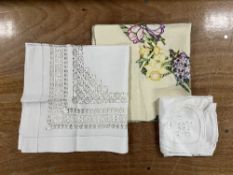 Three antique and vintage tablecloths, to include white cotton lace crochet, cut out and embroidered