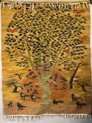 A hand knotted wool Kilim rug with a warm toned abrashed ground with deep orange sunset motif,