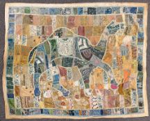 An antique handmade Suzani wedding quilt, showcasing intricate embroidery, needlework, applique