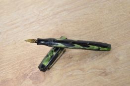 A Dart lever fill fountain pen in Green and Black marble with single narrow cap band having glass