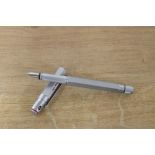 A boxed Rotring 600 converter fill fountain pen of hexagonal form