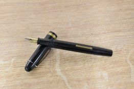 A High Class lever fill fountain pen waved Black with lined cap band having an ABC Gold Plated nib