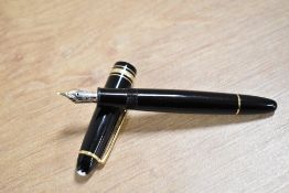 A Montblanc Meisterstuck cartridge fill fountain pen (MK1073238) in black with gold trim having 4810