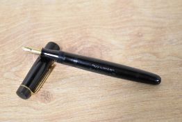 An Oxonian lever fill fountain pen by H J Ryman Ltd in Black having Warranted 14CT 1st Quality Nib.
