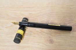 An Ingersoll No20 lever fill fountain pen in black with single narrow cap band having Ingersoll 14CT