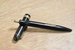 A Selsdon lever fill fountain pen in Black with wide chevroned design cap band having WHS 14CT nib
