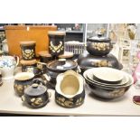 A selection of Denby Bakewell pattern kitchen wares, to include lidded storage jars, casserole dish,