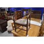 A 19th Century mahogany carver chair having drop in woolwork seat , stamped to front for Gillows