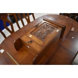 Local interest* Ernest John Oldcorn, an Arts & Crafts oak wall mounted cupboard, having a slender