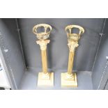 Two 19th-century brass Neoclassical-style Corinthian column candle sticks/lamp bases, featuring