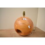 A mid to late 20th-century Swedish-style pine wood table lamp base, featuring a spherical base