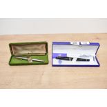 Two boxed Waterman Fountain pens a Waterman Expert in Black and a Waterman CF in chrome with gold